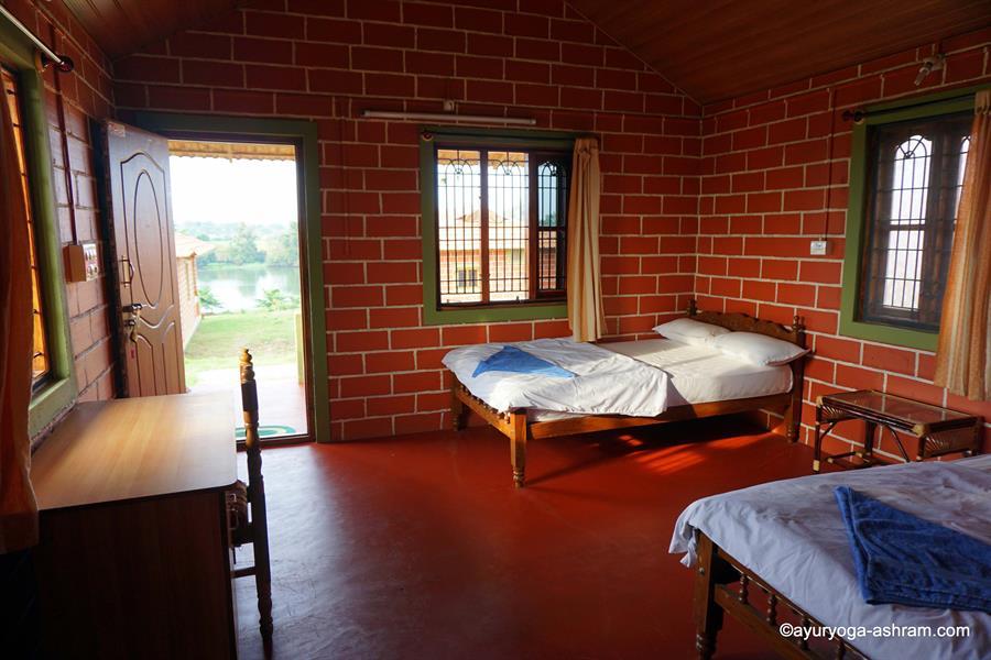 01 AyurYoga Eco-Ashram, India, 02 Riverside Cottage Bedroom (1)